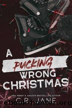 A Pucking Wrong Christmas: A Hockey Romance by C.R. Jane