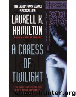 A caress of twilight by Laurell K. Hamilton