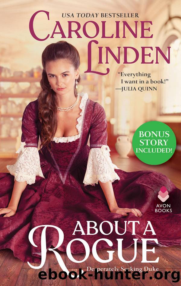 About a Rogue (Bonus Short Story Included) by Caroline Linden