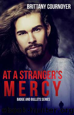 At a Stranger's Mercy (Badge and Bullets Book 1) by Brittany Cournoyer