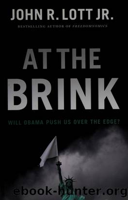 At the brink : will Obama push us over the edge? by Lott John R. Jr. 1958-
