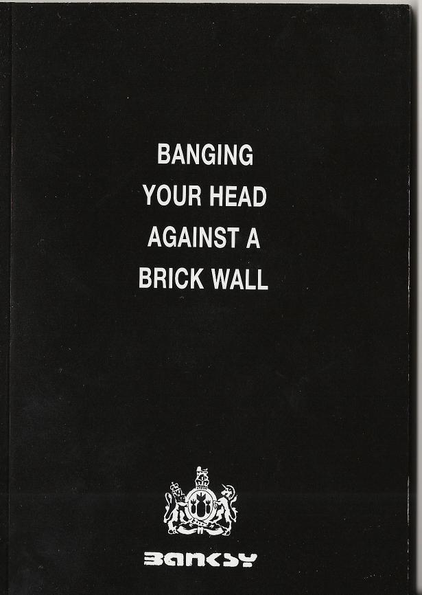 Banging Your Head Against a Brick Wall by Banksy