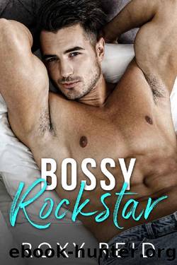 Bossy Rockstar: A Billionaire Enemies to Lovers Romance by Roxy Reid