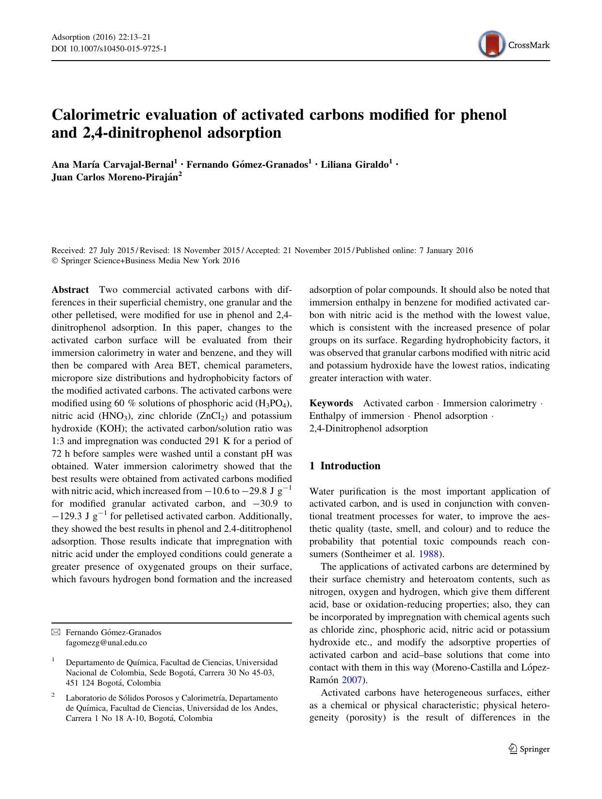 Calorimetric evaluation of activated carbons modified for phenol and 2,4-dinitrophenol adsorption by unknow