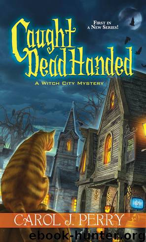 Caught Dead Handed by Carol J. Perry