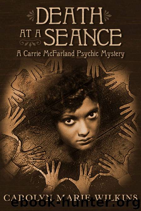 Death at a Seance by Carolyn Marie Wilkins