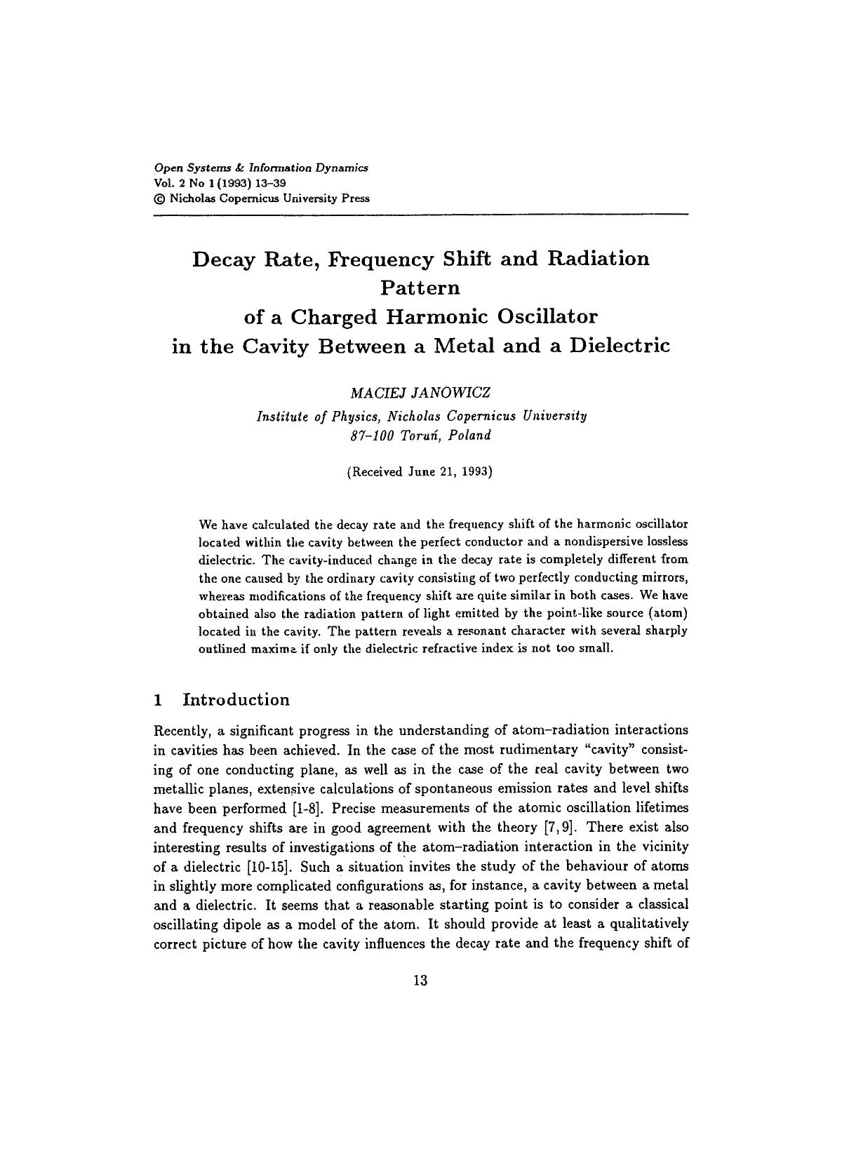 Decay rate, frequency shift and radiation pattern of a charged harmonic oscillator in the cavity between a metal and a dielectric by Unknown