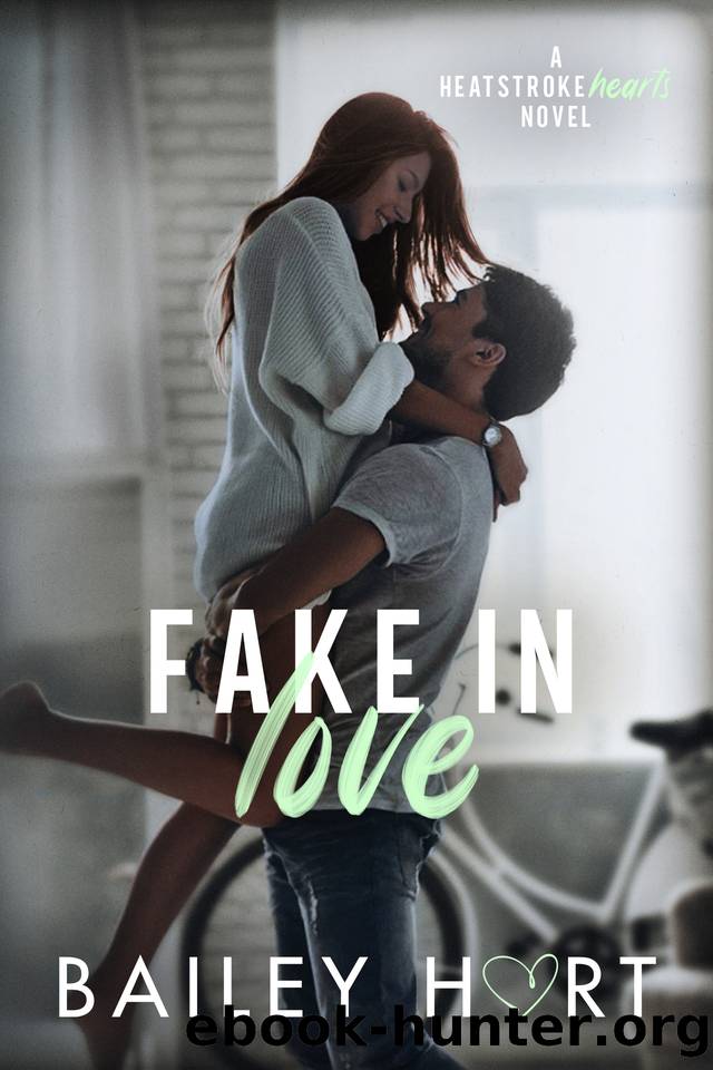 Fake in Love: An Enemies to Lovers Romance (Heatstroke Hearts Book 2) by Bailey Hart