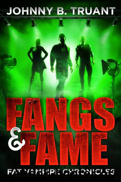 Fangs and Fame by Johnny B. Truant