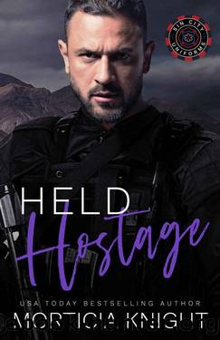 Held Hostage: An MM SWAT Suspense Romance (Sin City Uniforms Book 4) by Morticia Knight