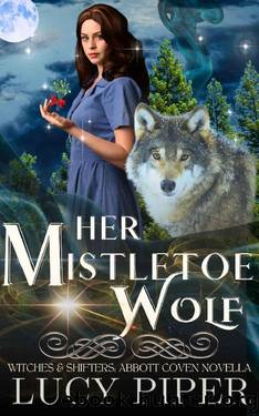 Her Mistletoe Wolf: A Holiday Romance (Witches and Shifters: Abbott Coven) by Lucy Piper