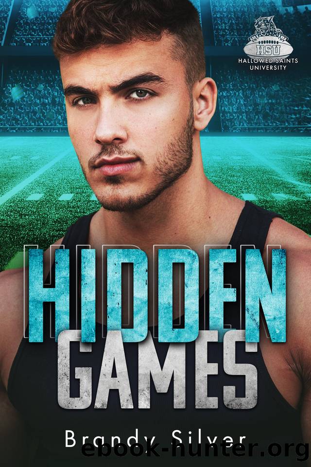 Hidden Games: Enemies-to-Lovers Football Romance Stand-Alone (Hallowed Saints University) by Brandy Silver