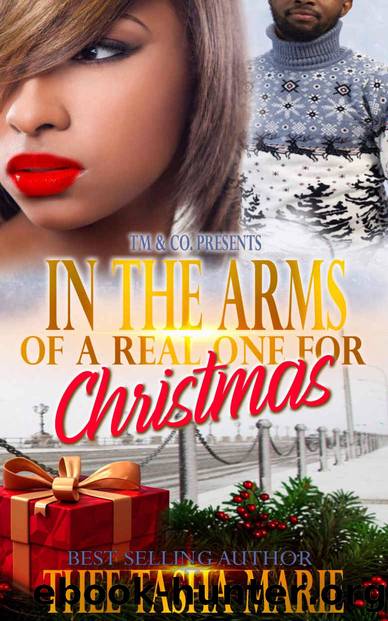 In The Arms Of A Real One For Christmas by Thee Tasha Marie