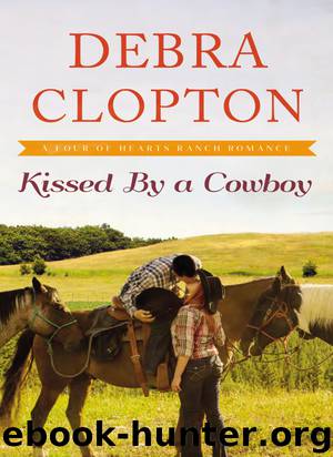 Kissed by a Cowboy by Debra Clopton