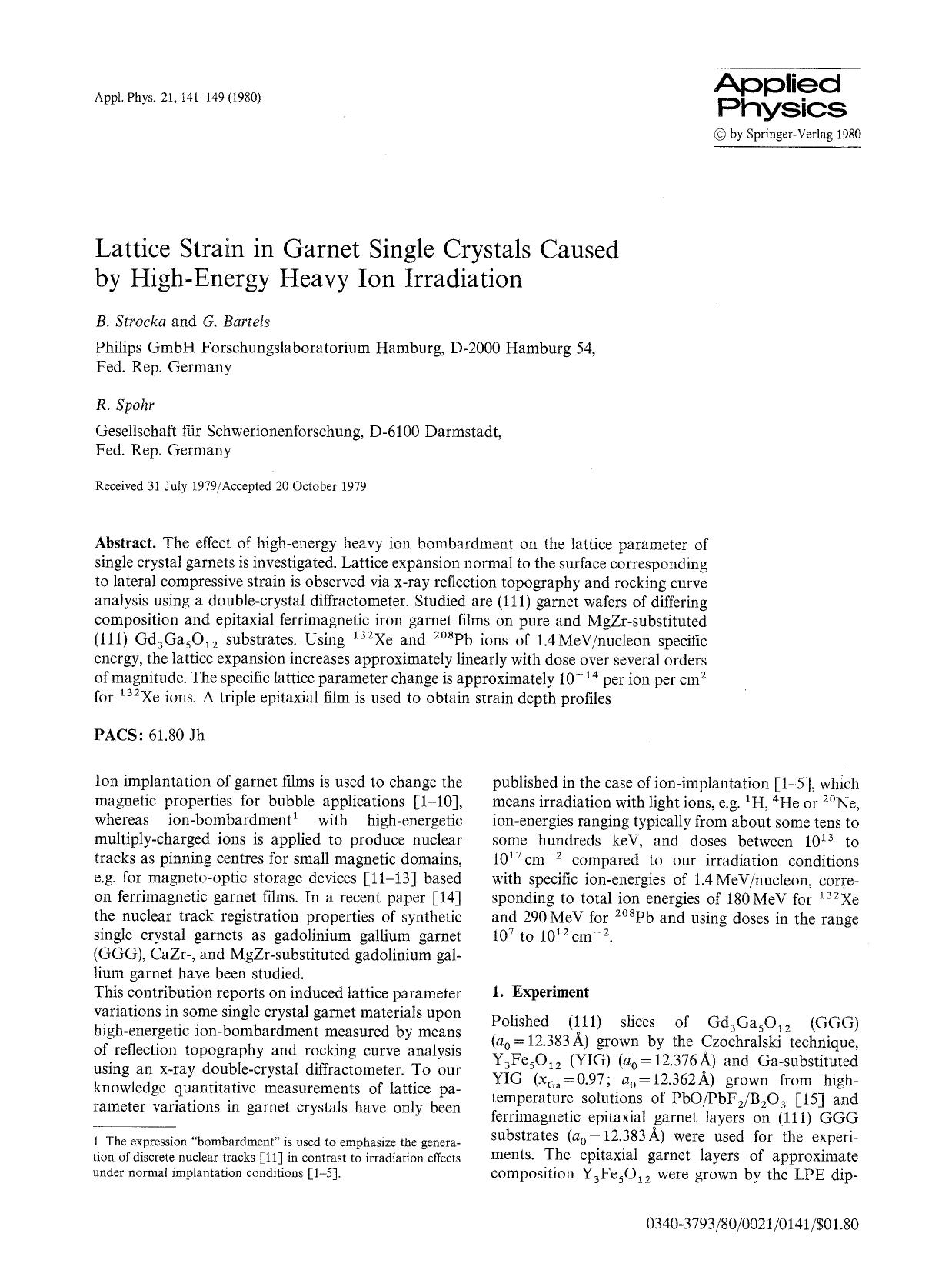 Lattice strain in garnet single crystals caused by high-energy heavy ion irradiation by Unknown