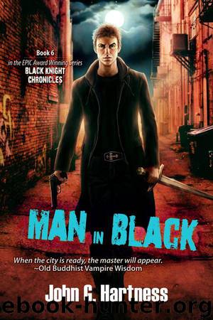 Man in Black by John G. Hartness