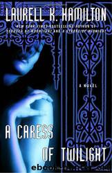 Merry Gentry #02 - A Caress of Twilight by Laurell K. Hamilton