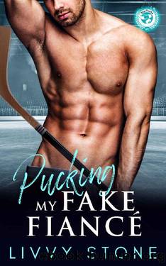 Pucking my Fake FiancÃ©: An Enemies to Lovers Small Town Romance (Billionaire Grumps) by Livvy Stone