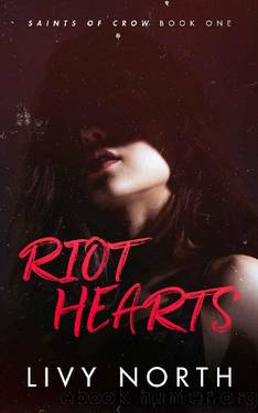 Riot Hearts: An Enemies to Lovers Romance (Saints of Crow Book 1) by Livy North