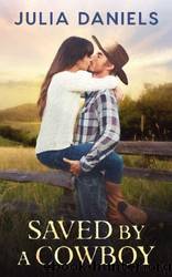 Saved by a Cowboy: A Western Romance by Julia Daniels