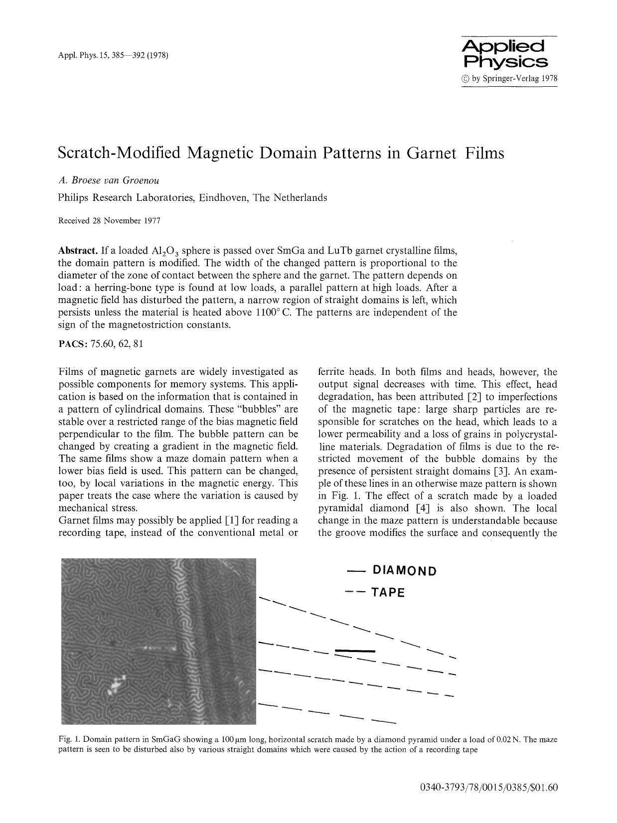 Scratch-modified magnetic domain patterns in garnet films by Unknown