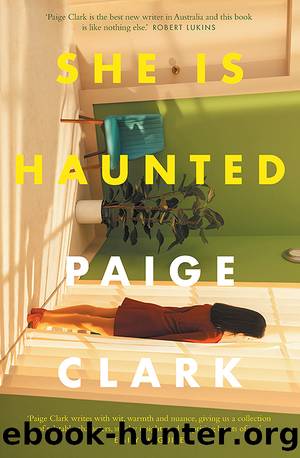 She Is Haunted by Paige Clark