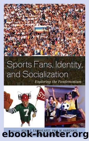 Sports Fans, Identity, and Socialization by Adam C. Earnheardt