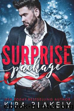 Surprise Package: A Bad Boy Christmas Romance by Kira Blakely