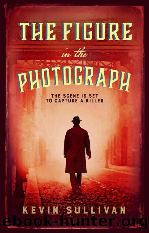 The Figure in the Photograph by Kevin Sullivan