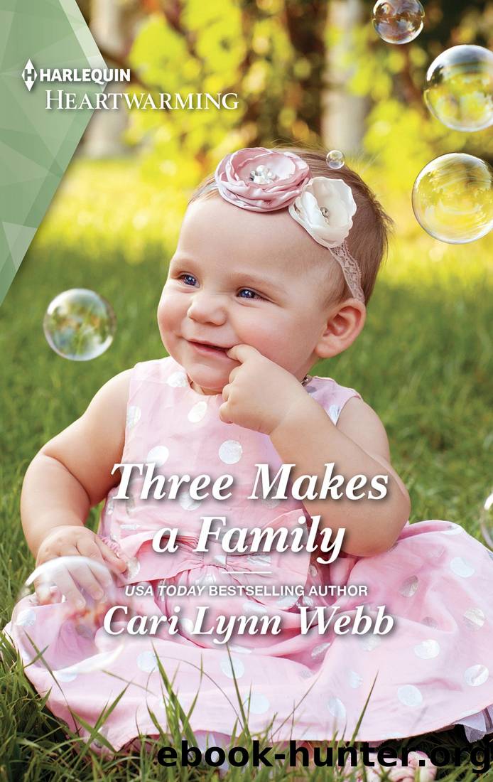 Three Makes a Family--A Clean Romance by Cari Lynn Webb