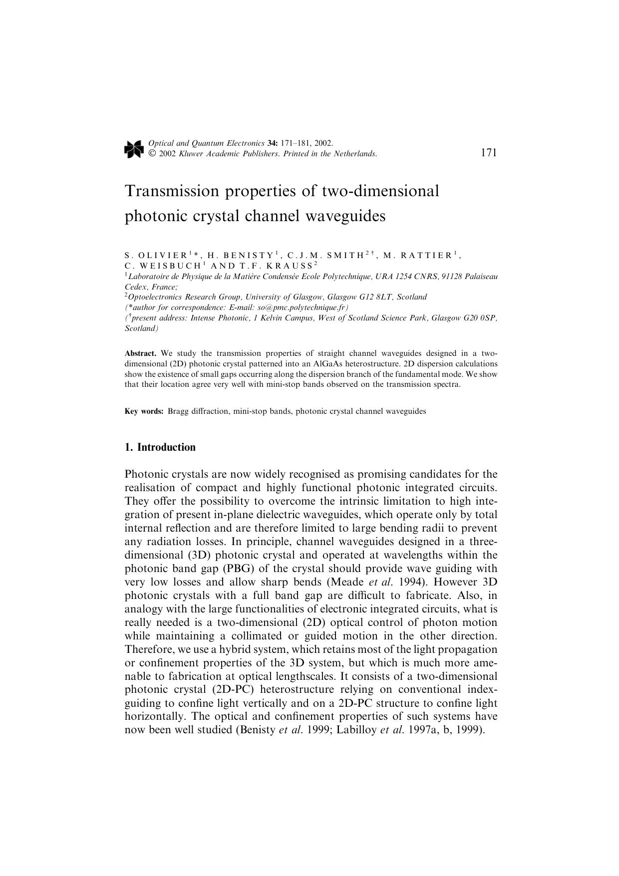 Transmission properties of two-dimensional photonic crystal channel waveguides by Unknown