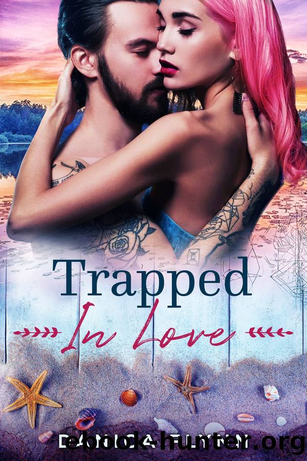 Trapped In Love: an Enemies to Lovers Smalltown Romance by Danica Flynn