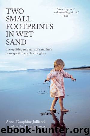 Two Small Footprints in Wet Sand by Anne-Dauphine Julliand