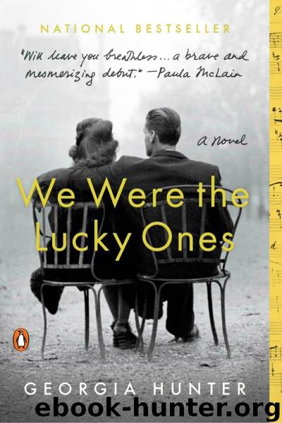 We Were the Lucky Ones: A Novel by Georgia Hunter