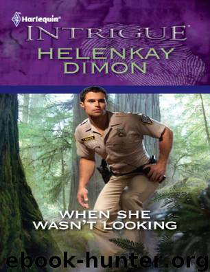 When She Wasn't Looking by Helenkay Dimon