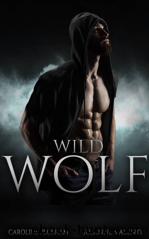 Wild Wolf (Darkmore Penitentiary Book 4) by Caroline Peckham & Susanne Valenti